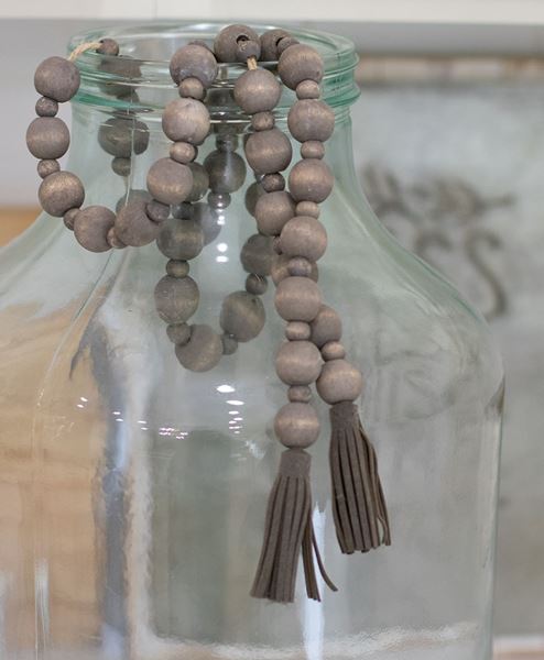 Picture of Distressed Wooden Bead Garland With Tassels